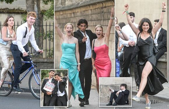 Oxford students make their way home from Magdalen College's ball
