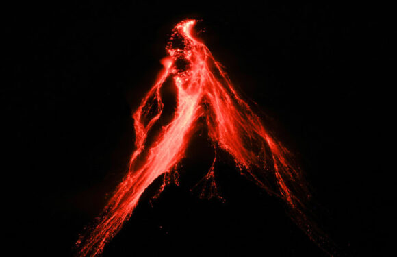 Risk of eruption forces evacuations as Philippines’ most active volcano rumbles