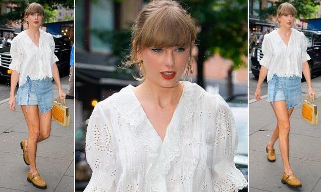 Taylor Swift bares her long legs in denim skirt while going to studio