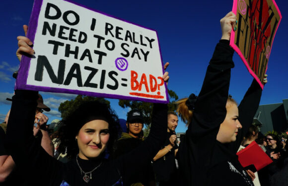 Anti-fascist protesters rally outside neo-Nazi weightlifting event