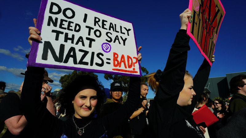 Anti-fascist protesters rally outside neo-Nazi weightlifting event