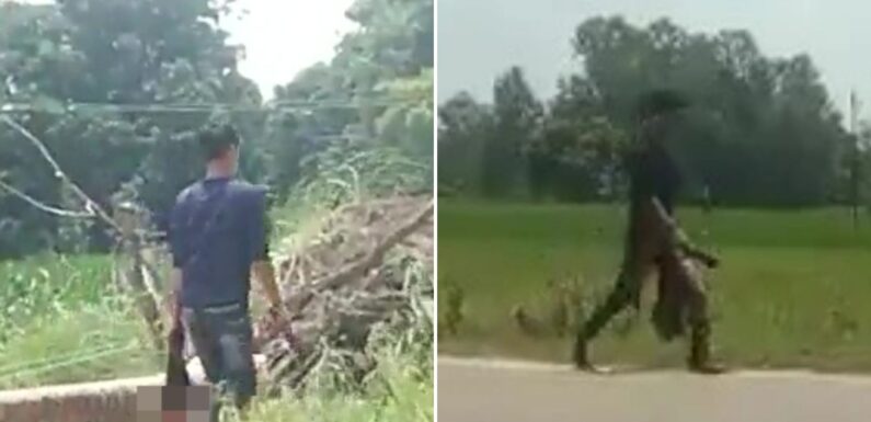 Chilling moment man carries his sister’s severed head in street after killing her for trying to marry against his wishes | The Sun