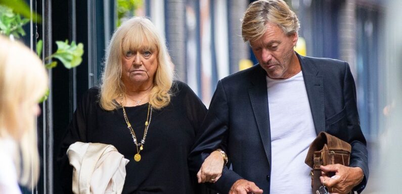 GMB’s Richard Madeley and wife Judy Finnigan walk arm-in-arm after lunch as he carries her bag