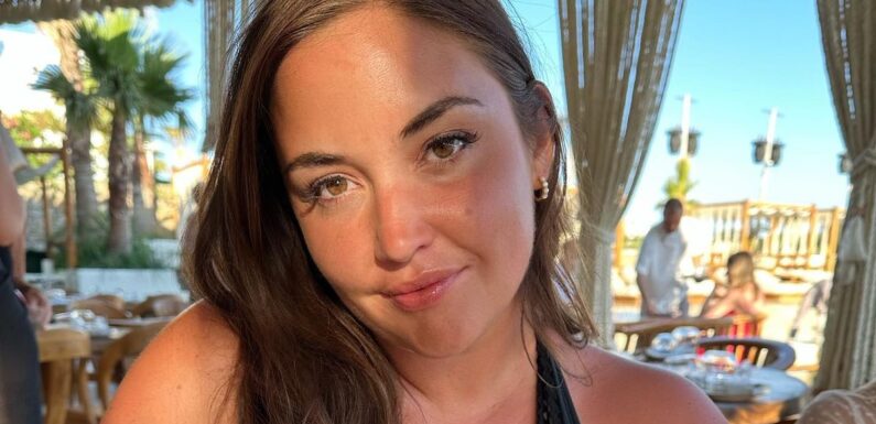 Jacqueline Jossa strips down to plunging black swimsuit in sizzling holiday snap