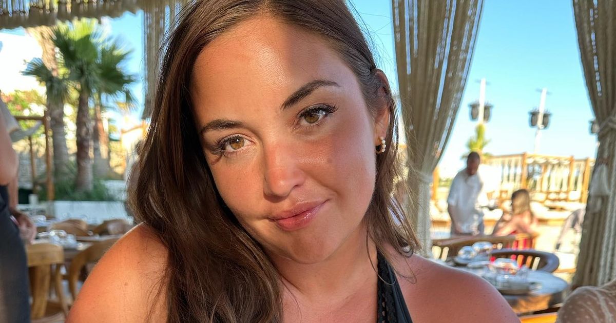 Jacqueline Jossa strips down to plunging black swimsuit in sizzling holiday snap