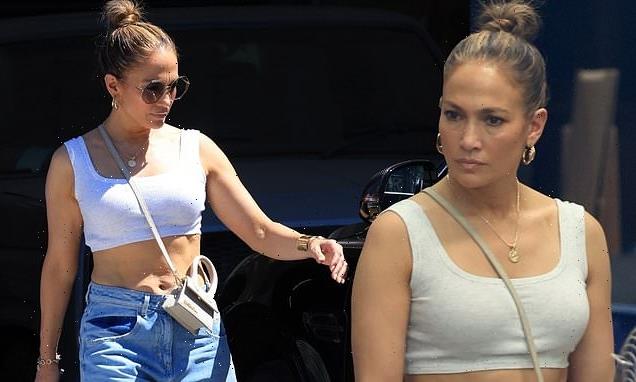 Jennifer Lopez highlights toned tummy in a crop top furniture shopping