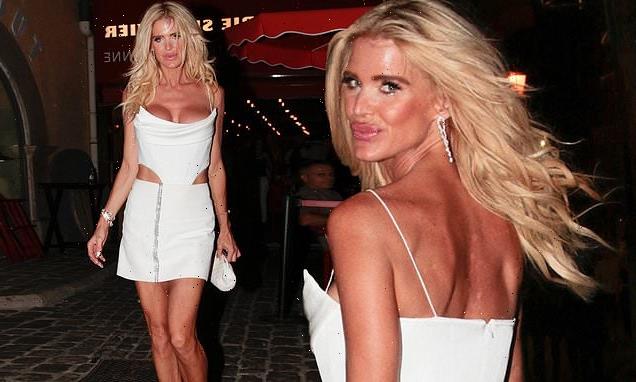 Victoria Silvstedt sends temperatures soaring in a white cut-out dress