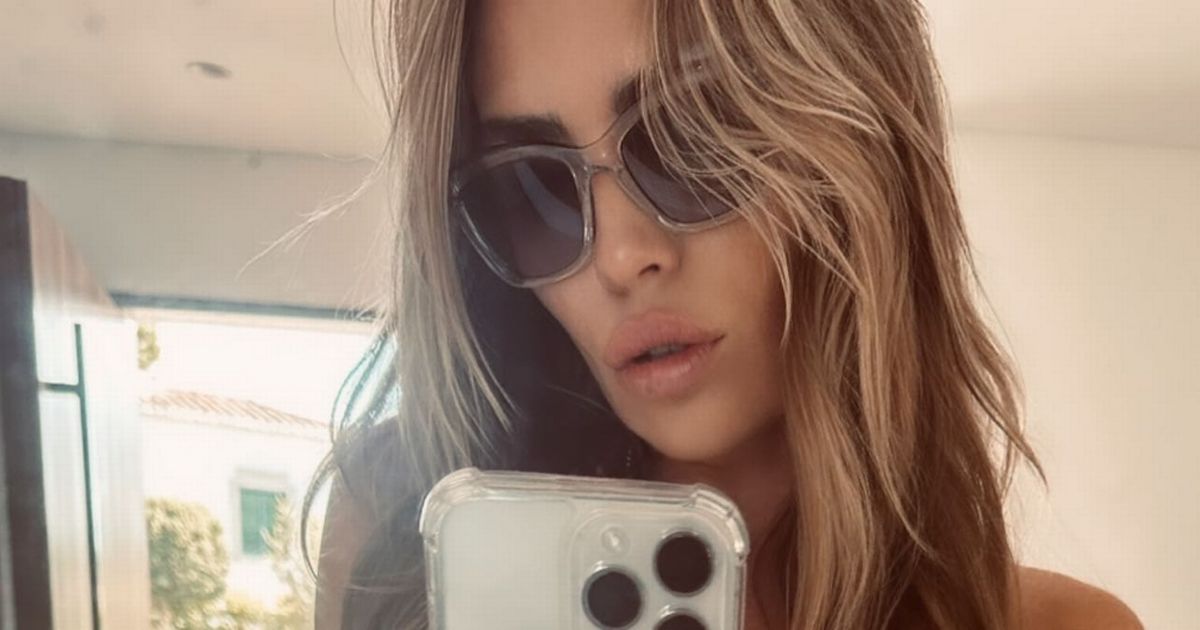 Abbey Clancy showcases washboard abs in tiny bikini in jaw-dropping holiday snap