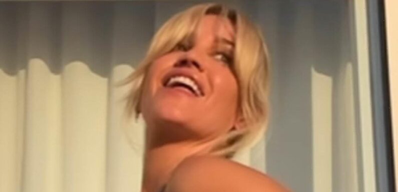 Ashley Roberts displays her jaw dropping figure in a lace lingerie set