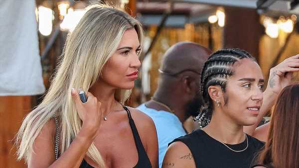 Christine McGuinness walks hand-in-hand with singer Chelcee Grimes