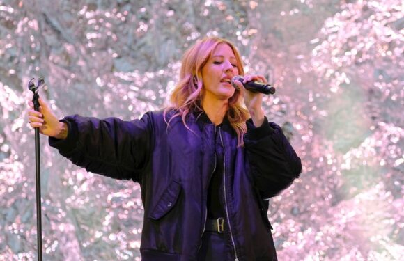 Ellie Goulding screams in horror on stage as she’s hit with burning special effects