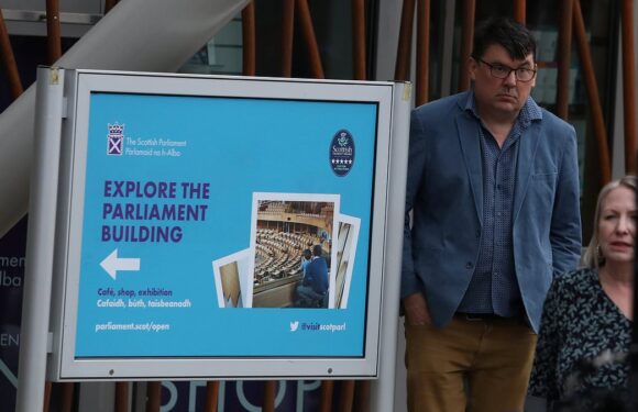 Graham Linehan arrives to perform outside Scottish Parliament