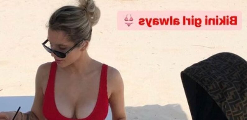 Helen Flanagan puts on a VERY busty display in red bikini in Greece