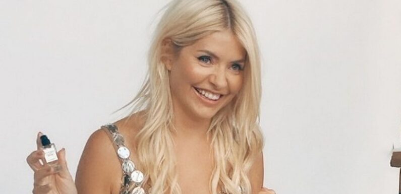 Holly Willoughby parades toned figure as she steals show in sheer minidress