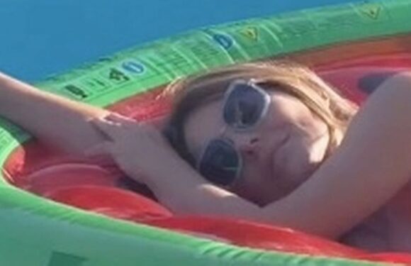 Liz Hurley sends fans wild as she strips completely nude for sizzling pool clip