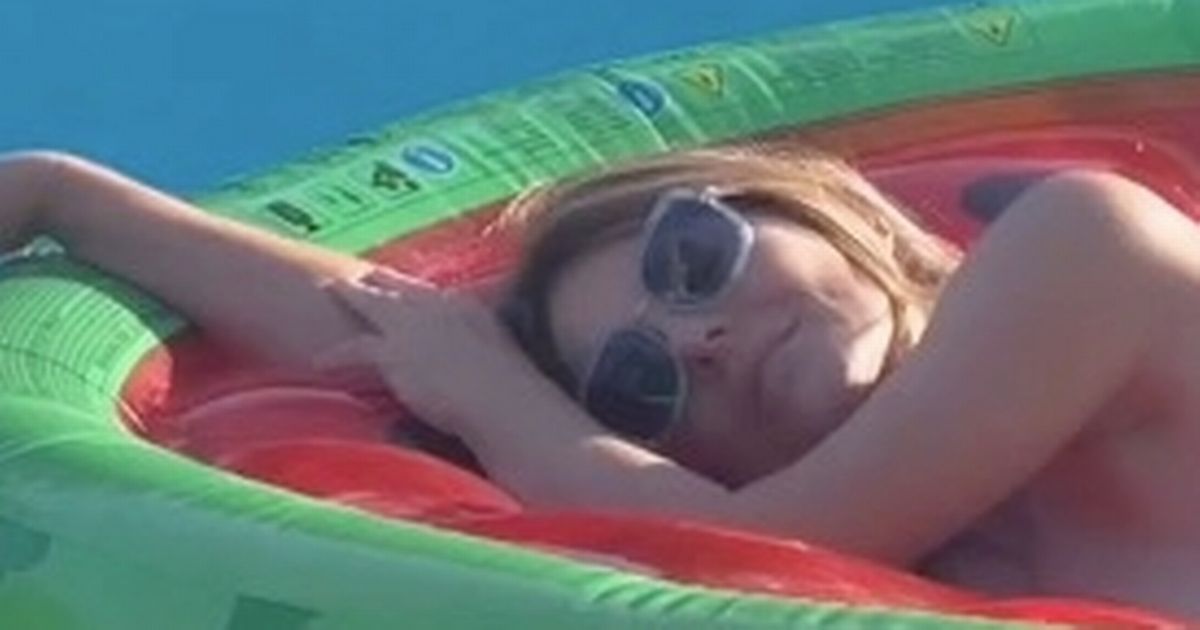 Liz Hurley sends fans wild as she strips completely nude for sizzling pool clip