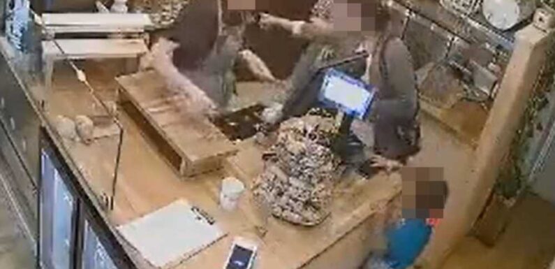 Shocking moment child swipes phone from shop counter as woman ‘scams’ change out of till | The Sun