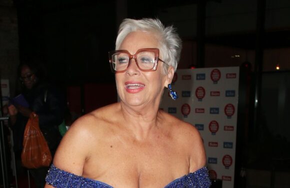 Denise Welch almost spills out of plunging dress as she steps out at awards bash