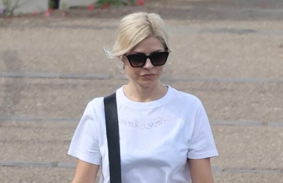 Holly Willoughby dons leggy denim shorts for a dog walk