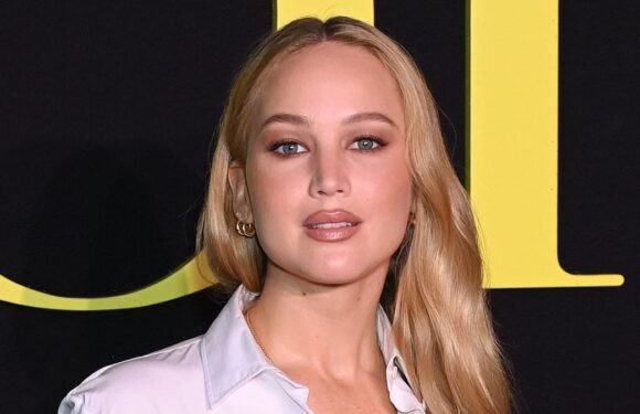 Jennifer Lawrence cuts a chic figure at the Dior show