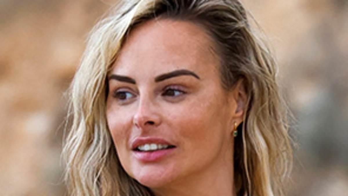 Rhian Sugden flaunts her famous curves in VERY plunging swimsuit