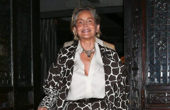 Sharon Stone, 65, with producer Michael Carbajal