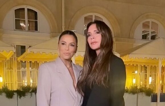 Victoria Beckham supported by best pal Eva Longoria at Paris Fashion Week show