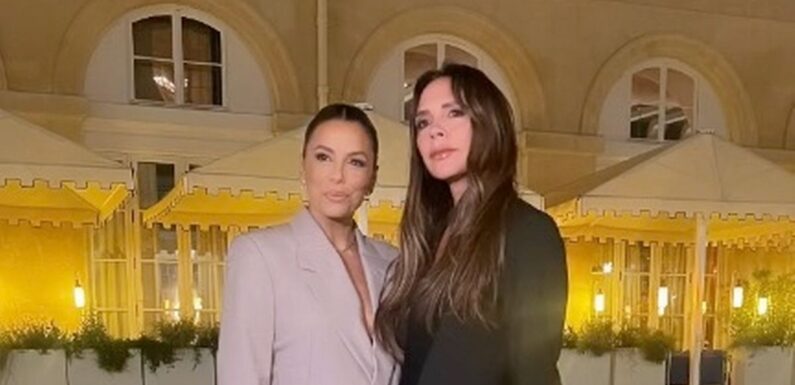 Victoria Beckham supported by best pal Eva Longoria at Paris Fashion Week show