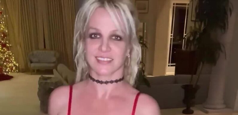 Britney Spears dances around in a sheer red dress amid legal drama