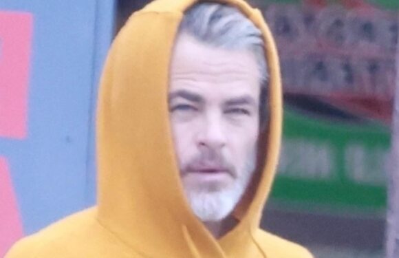 Chris Pine the silver fox has legs for days in TINY shorts