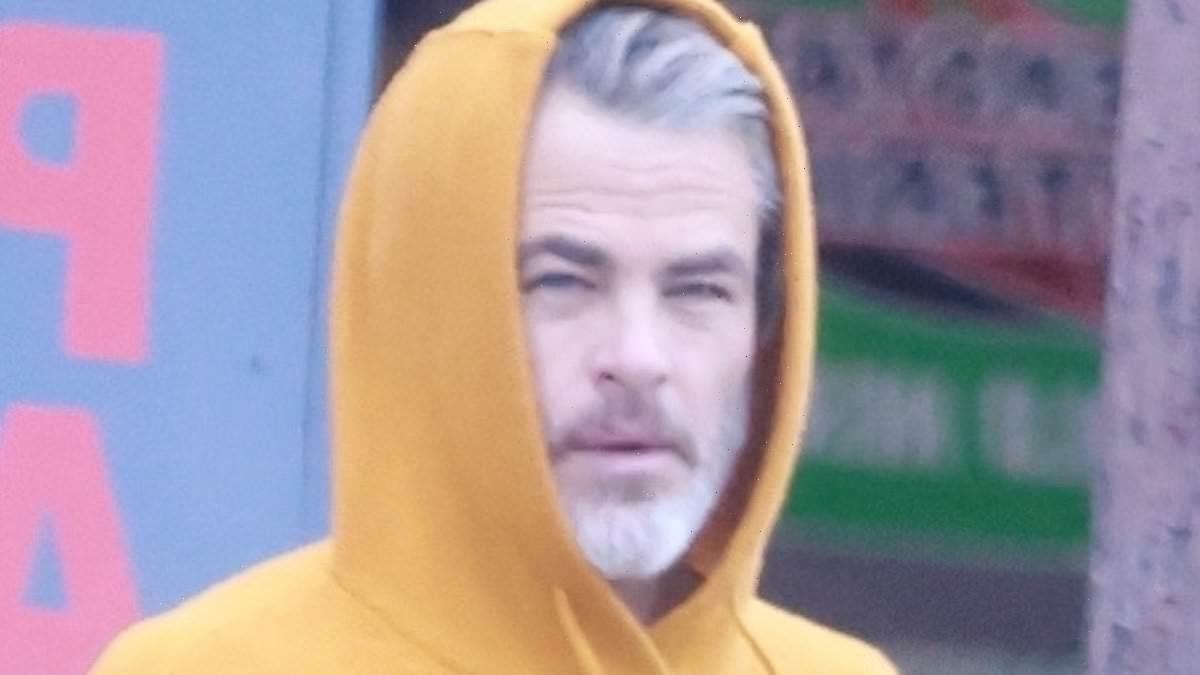 Chris Pine the silver fox has legs for days in TINY shorts