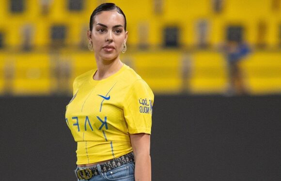 Georgina Rodriguez walks onto the pitch with her £115,000 Birkin bag