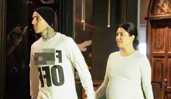 Kourtney Kardashian and Travis Barker match in black and white looks
