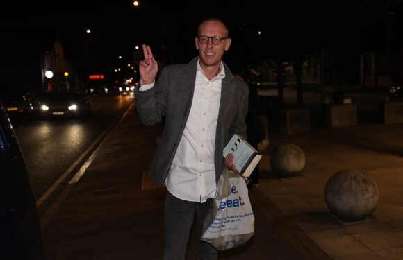 Laurence Fox holds book about GULAGS after release from custody