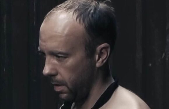 Shirtless Matt Hancock is interrogated by Liz Truss lookalike