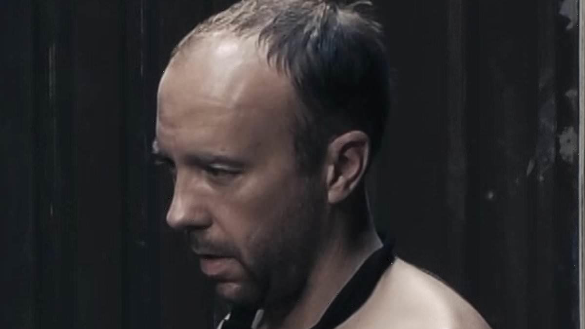 Shirtless Matt Hancock is interrogated by Liz Truss lookalike
