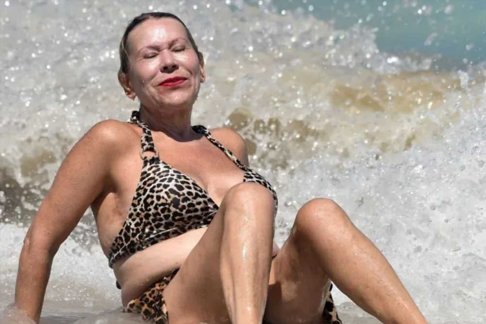 Tina Malone, 60, shows off 12st weight loss in leopard print bikini after boasting about wild sex life with toyboy | The Sun