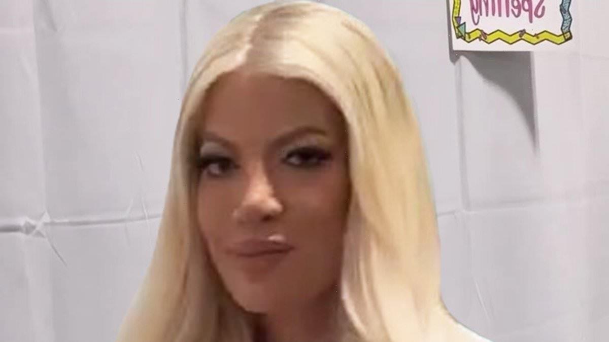 Tori Spelling shows plump pout after being accused of getting FILLERS
