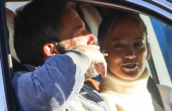 Ben Affleck puffs on a cigarette while driving wife Jennifer Lopez