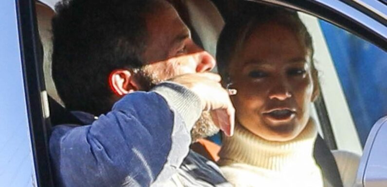 Ben Affleck puffs on a cigarette while driving wife Jennifer Lopez