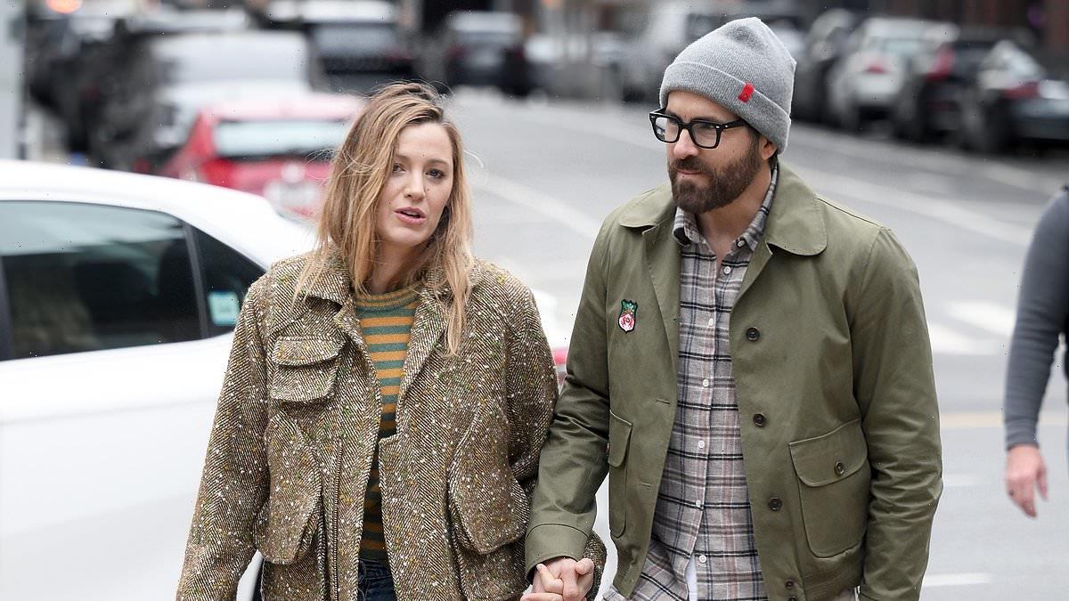Blake Lively and Ryan Reynolds hold hands on a walk