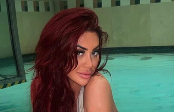 Chloe Ferry puts on a VERY busty display in a TINY nude bikini