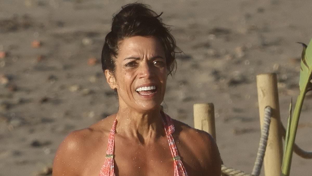 Jenny Powell, 55, shows off her incredible figure in a pink bikini