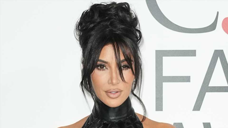 Kim Kardashian shows off stunning curves in tight backless dress in new photos of star at CFDA Fashion Awards | The Sun