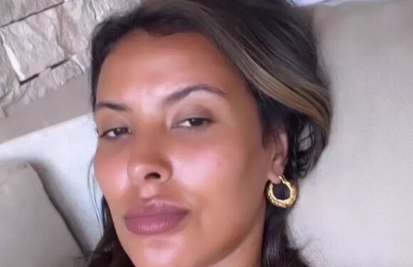 Love Island Games host Maya Jama strips off in bed and covers up with duvet