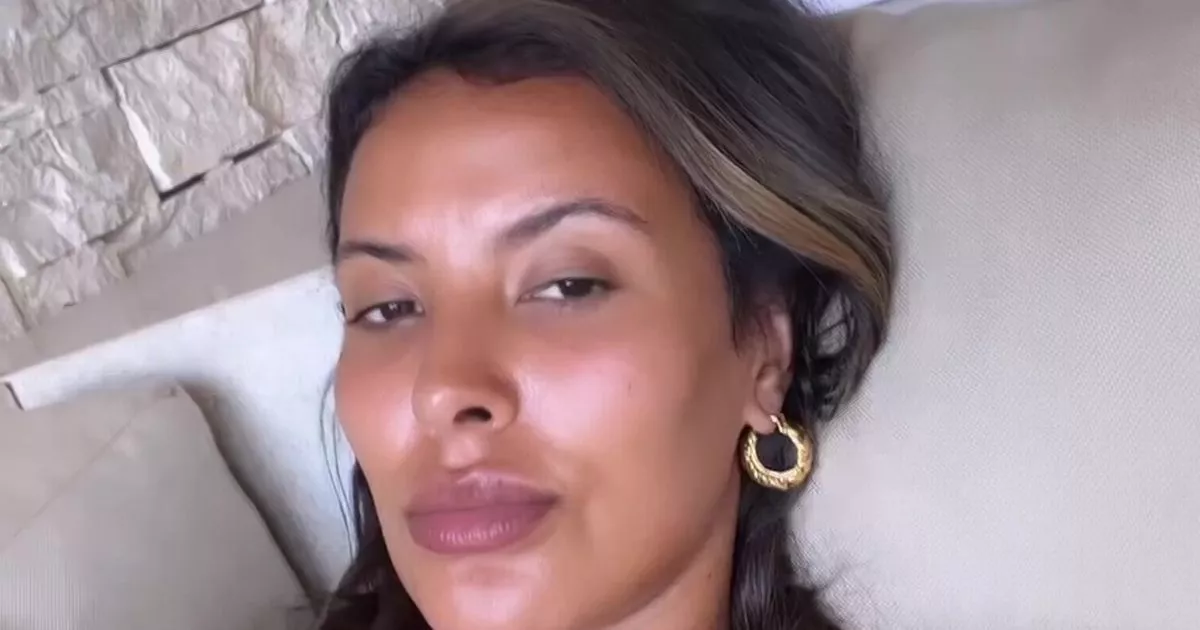 Love Island Games host Maya Jama strips off in bed and covers up with duvet