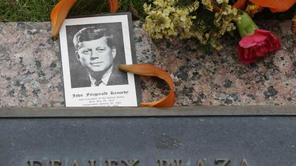 Mourners gather in Dealey Plaza to mark JFK assassination 60th