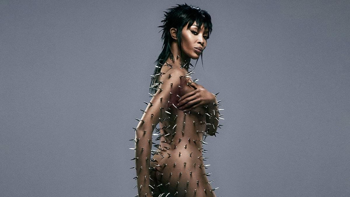 Naomi Campbell poses nude with her body covered in silver spikes