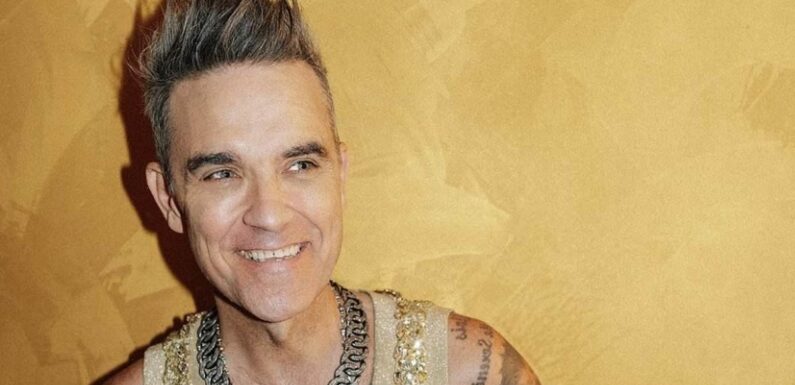 Robbie Williams claims he's going through 'manopause'