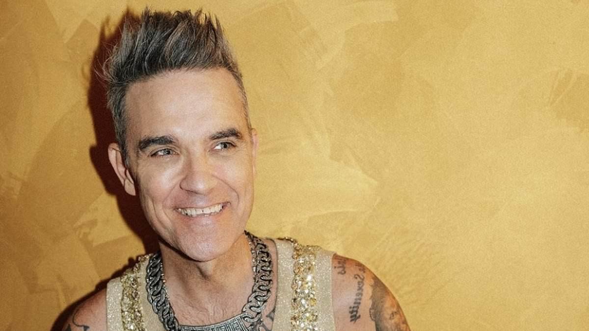 Robbie Williams claims he's going through 'manopause'